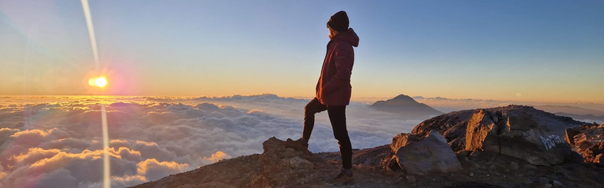 Tajumulco volcano hike in guatemala hiker on top of mountain