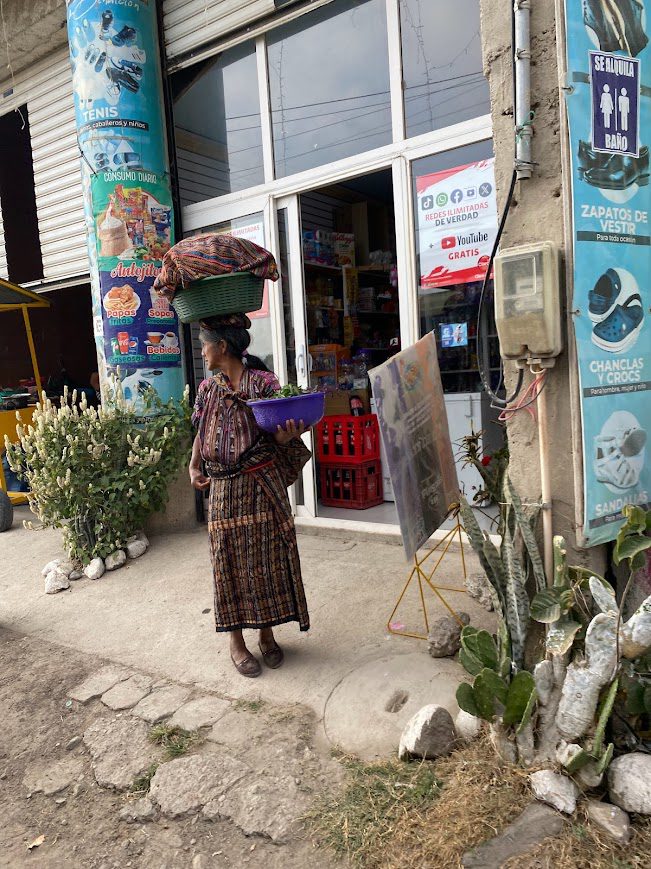 guatemala woman with basket on her head